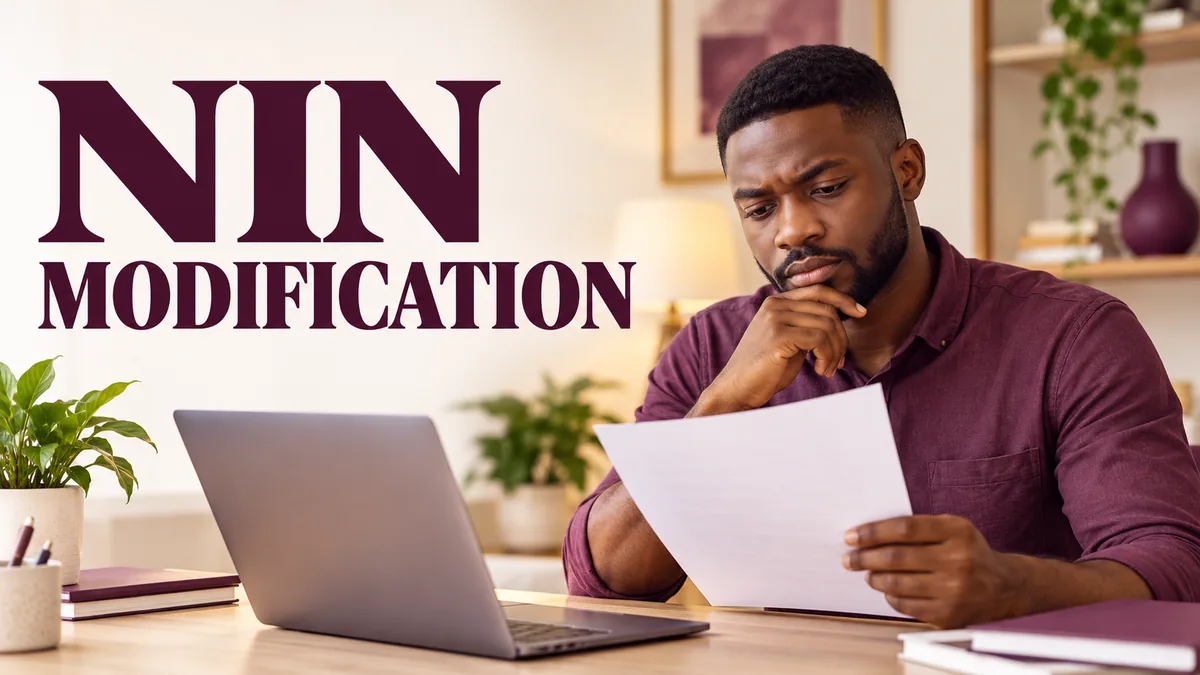 Nigerian adult checking identity documents beside a laptop with NIN modification headline.